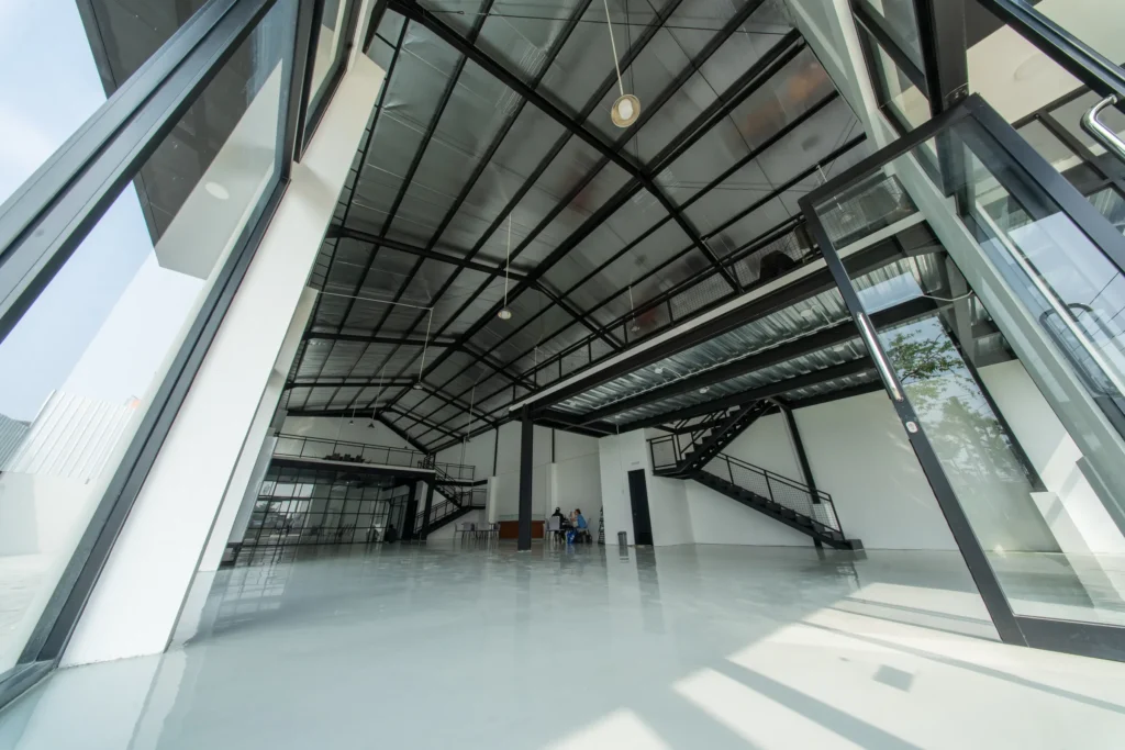 Spacious interior of a BEST warehouse unit with steel structure and mezzanine