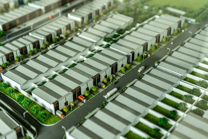Scale model of the BEST industrial estate masterplan with rows of warehouse units and estate roads