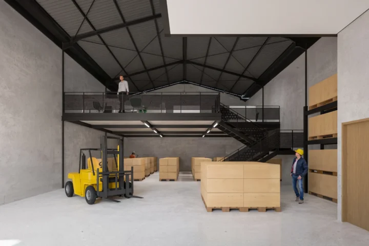 Interior gudang industri BEST dengan forklift, stok barang, dan mezzanine